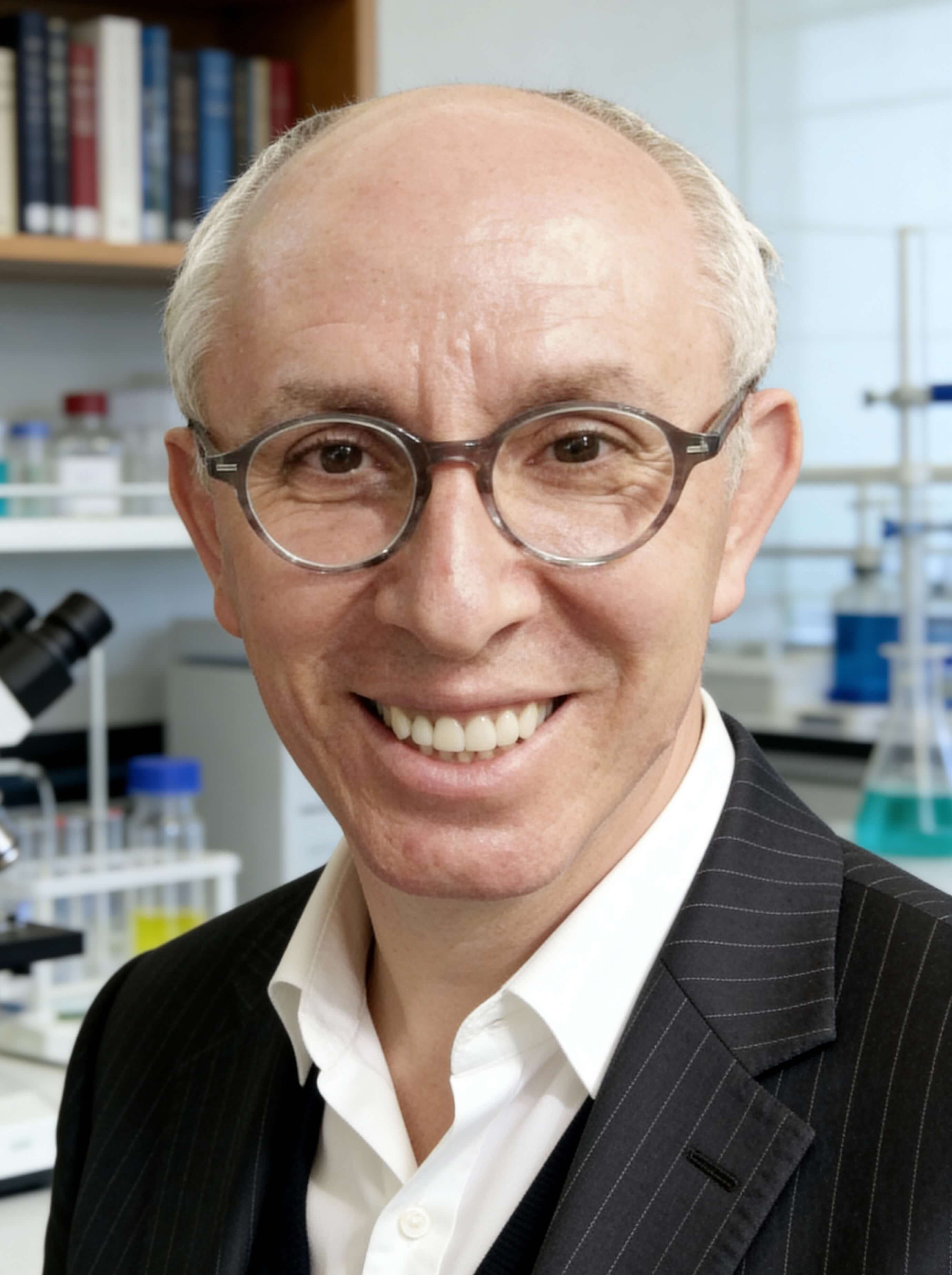 Portrait of Dr. Igor Roshkovan, founder of Meddent Innovative Concepts, in a laboratory.